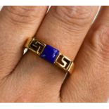 An 18ct gold and lapiz lazuli ring, of Greek key design, size O, 4.5g.