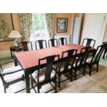 A 20th century Chinese ebonised dining table, with satinwood inlaid top, on square legs, together