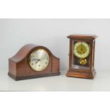 A mahogany and glass cased eight day mantel clock together with a mahogany cased mantel clock with