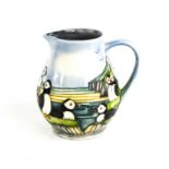 A Moorcroft puffin jug, dated 1997, marked to the base Kerri, 14.5cm high.