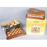 A vintage wooden cased toy Grand Baby piano together with Carlton chess pieces and a Gold Label