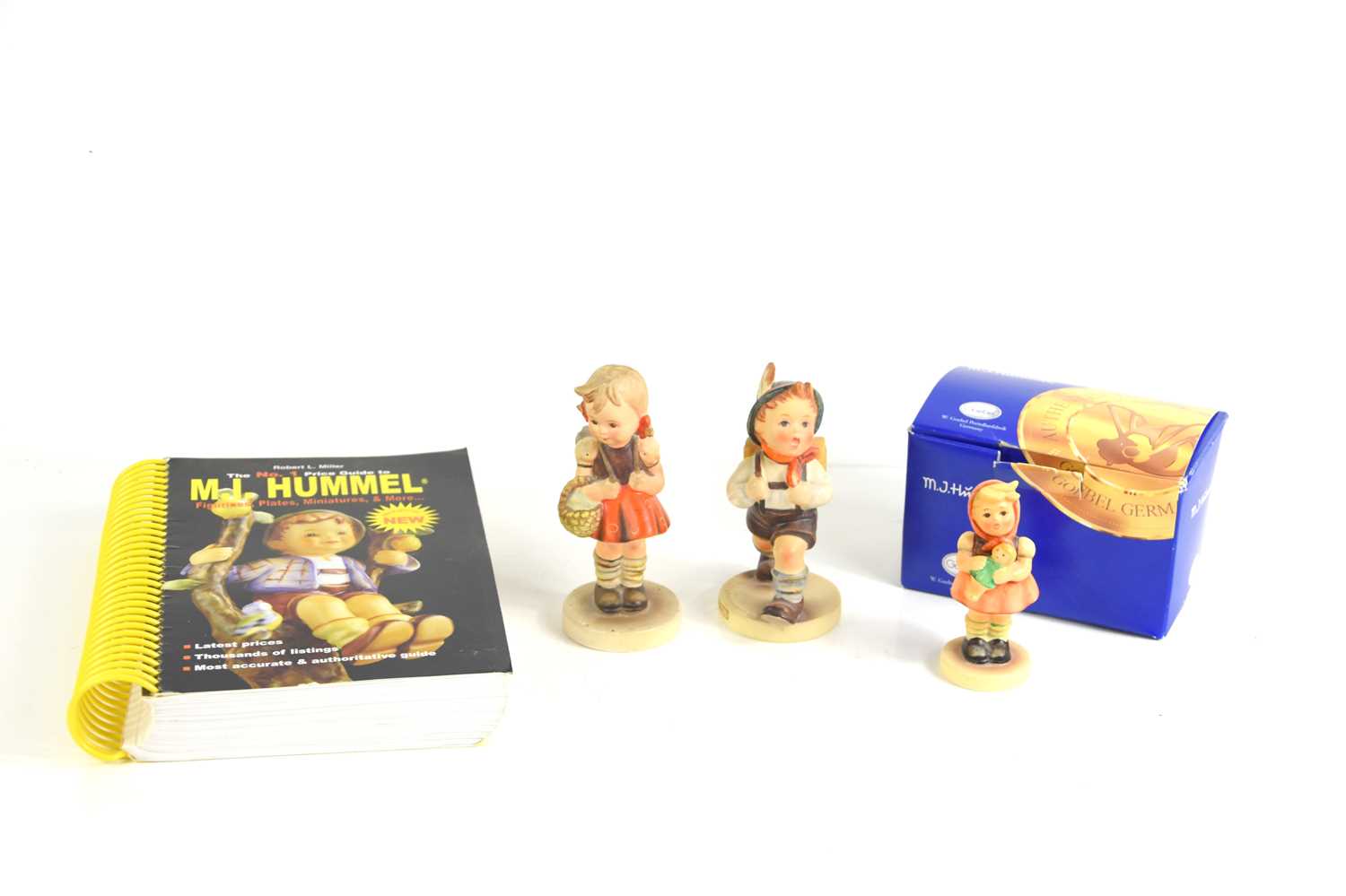 A group of three Goebel Hummel figures, comprising number 239/B, Girl With Doll, boxed, number 812/