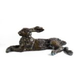 John Cox (1952-2014): A life size bronze of a resting hare, cast by the lost wax method, foundry