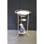 A wrought iron wash stand with bowl and jug, 85cm high, together with a group of Victorian and later