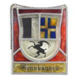 A lead stained glass wall hanging depicting Graubünden coat of arms, 24cm by 20cm.