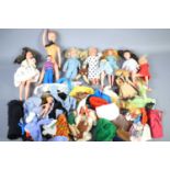 A group of vintage dolls and clothing to include examples by Hasbro, Palitoy "Pete" and possibly