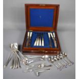 A 19th century mahogany cased part set of fish knives and forks with mother of pearl handles,