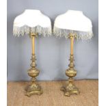 A pair of 19th century brass standard lamps, , converted to electric with cream silk shade and