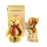 A Steiff 125yrs celebration teddy bear with box together with two other Steiff bears.