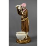 A Royal Worcester porcelain figurine; Water Carrier, puce mark to base, and impressed mark