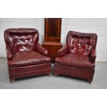 A pair of vintage red leather armchairs and matching stool, made by Century Furniture, Hickory North