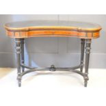 A Victorian ladies amboyna and burr walnut kidney shaped writing desk with leather writing