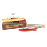 A vintage Hornby clockwork speedboat in the original box together with a Victory Industries "Miss