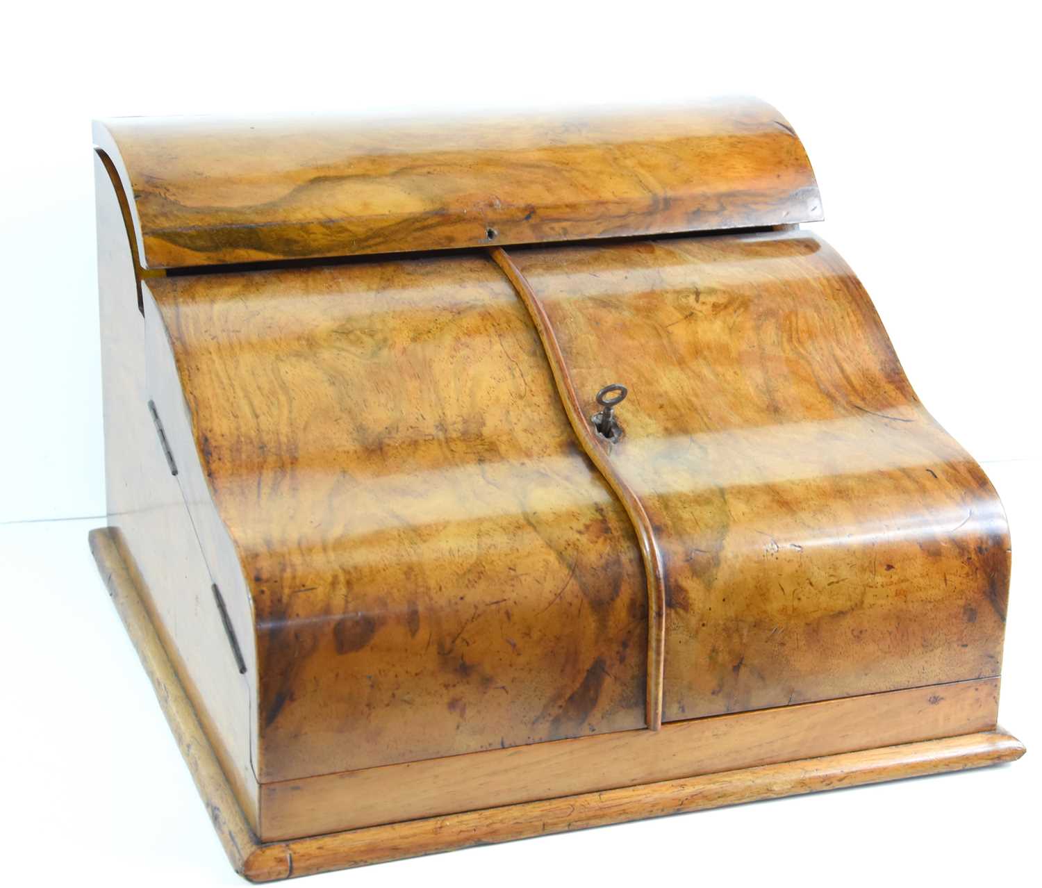 A 19th century Suter & Alexander walnut ladies table top writing box, opening to reveal a folding