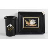 An antique Pietra Dura plaque depicting white tulip, in an ebonised frame, together with a similar