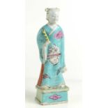 A 19th century Chinese Export Famille Rose figure of one of the eight immortals,21.5cm high, a/f.