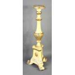 An Italian painted wood pricket stick with reeded column and triangular base, 63.5cm high.