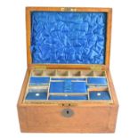 A 19th century burr walnut sewing box, with blue silk lined and fitted interior, 14.5cm high by 27.