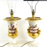 A pair of French urn lamps depicting a Roman horse drawn chariot and other Neoclassical figures with