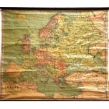 Two vintage George Philips and Sons canvas wall hanging maps of Europe and Wales.