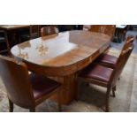 Manner of Harry and Lou Epstein: An Art Deco maple dining table with rounded rectangular top, raised