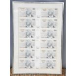 A framed set of twelve uncirculated and uncut Israel 50 Sheqalim banknotes, 28cm by 45cm.