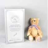 A Steiff 1992 replica of a 1912 Otto teddy bear with embroidered pads, in the original box and