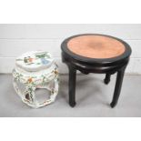 A Chinese circular top coffee table, ebonised, with burr wood inset top, together with a white