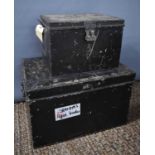 Two antique tin strong boxes, both painted black and having twin handles, 25cm high.