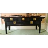 A 20th century Chinese ebonised sideboard, the rectangular top over an arrangement of five
