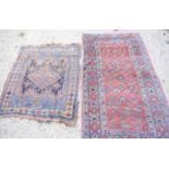 Two small Persian rugs, larger one 106cms by 185cms