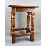 An early 18th century oak joint stool.