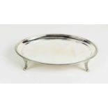 A silver card tray, of oval form, with splayed fluted feet, 4.37toz.