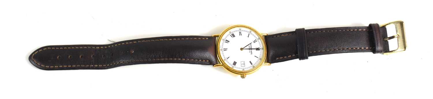 A Raymond Weil "Geneve" gold plated wristwatch with leather strap.