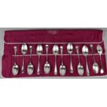 A set of twelve Victorian silver dessert spoons in the Hanovarian Rat Tail pattern, Maxfield & Sons,