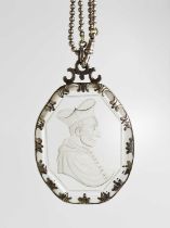 A 19th century silver and intaglio, likely rock crystal pendant necklace, depicting a Cardinal, 8 by