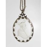 A 19th century silver and intaglio, likely rock crystal pendant necklace, depicting a Cardinal, 8 by