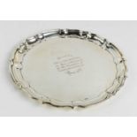 A small silver salver / card tray, Birmingham 1936, bearing presentation inscription and pie crust