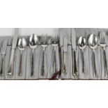 Two Lunt Silversmiths sterling silver eating sets, comprising two knives, two spoons, two forks,