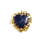 A 9ct gold and lapis lazuli set pendant in the form of a heart, 3.5cm long, 8.1g.