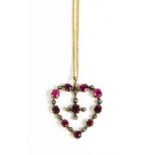 A 19th century 9ct gold, pink ruby and diamond heart form pendant and chain, the heart set with