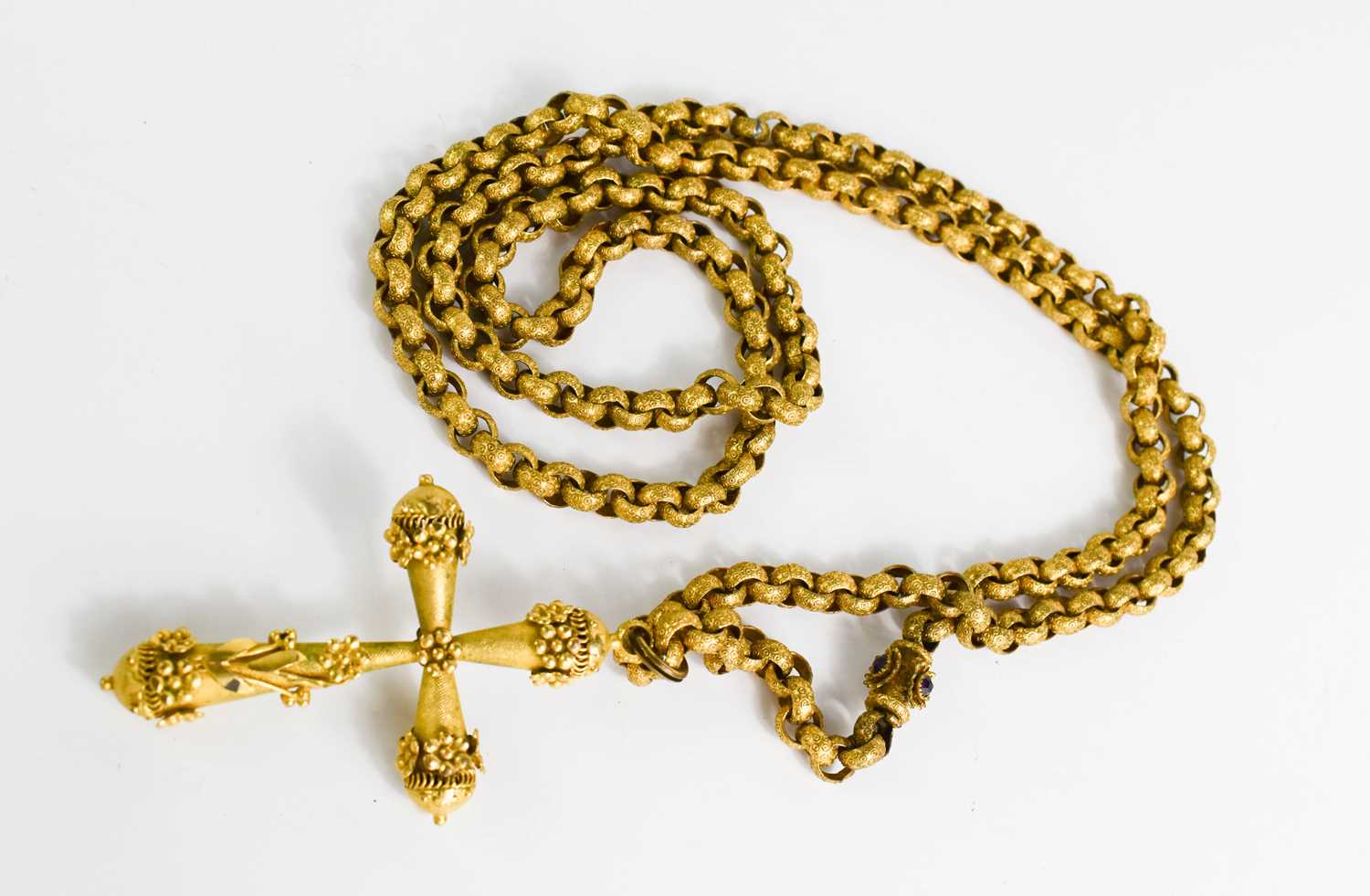 A French 19th century gilt metal cruciform pendant necklace, the clasp inset with amethyst, 129g.