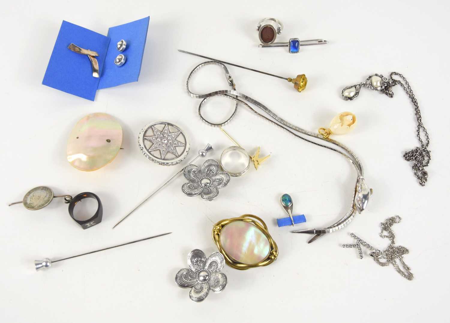 A group of silver and other jewellery to include hat pins, Victorian silver brooch, mother of