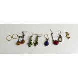 A group of earrings, to include a pair of 9ct gold hoops, pearl examples, silver drop earrings,