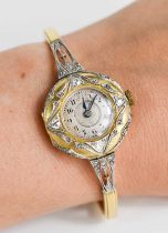 An 18ct gold and diamond ladies cocktail watch, with Arabic dial,the circular dial inset with