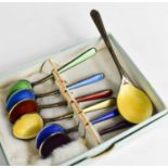 A set of silver and coloured enamel tea spoons, marked 925, together with a larger yellow enamel and