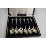 A set if six silver and enamelled spoons, Birmingham 1948, with white daisys on blue ground, in