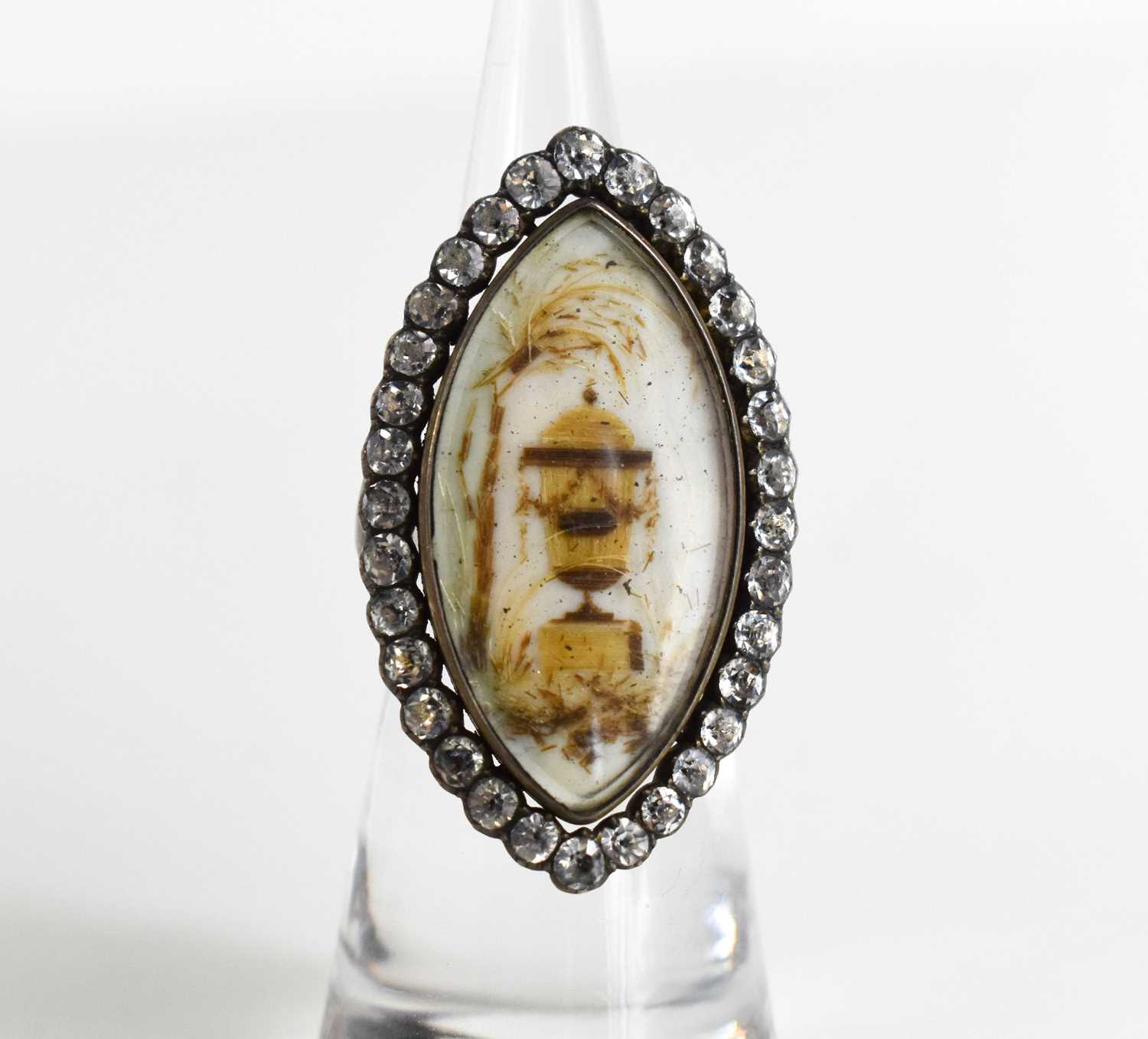 A Victorian white metal and paste mourning ring of marquise form, the enamel centre depicting an urn - Bild 2 aus 4