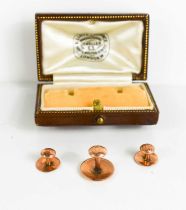 A 9ct rose gold collar stud set in the original presentation box, 2.45g.