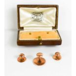 A 9ct rose gold collar stud set in the original presentation box, 2.45g.